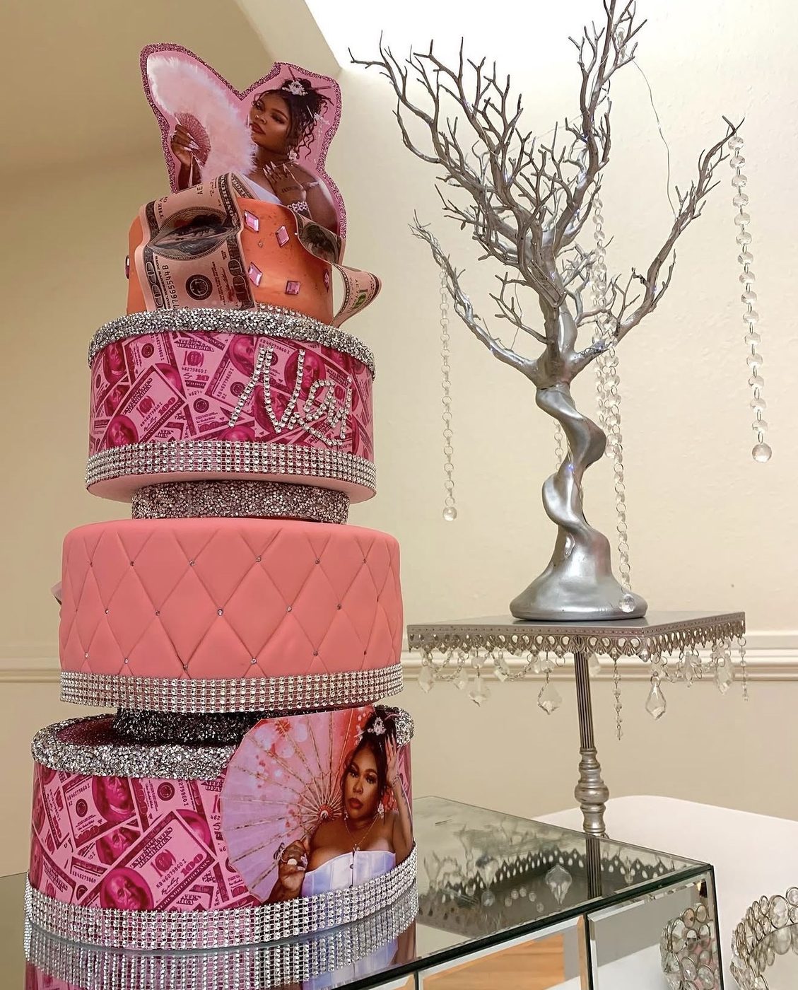 Law book cake topped with a gavel and gold scales of justice